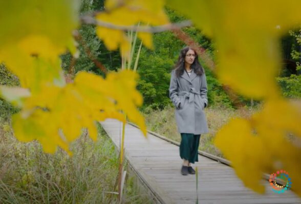 Dr. Mahima Gulati walking on a autumn path